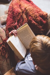 Child reading a book